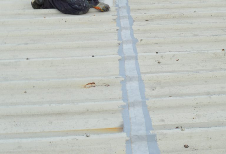 Tape applied for cut edge corrosion treatment